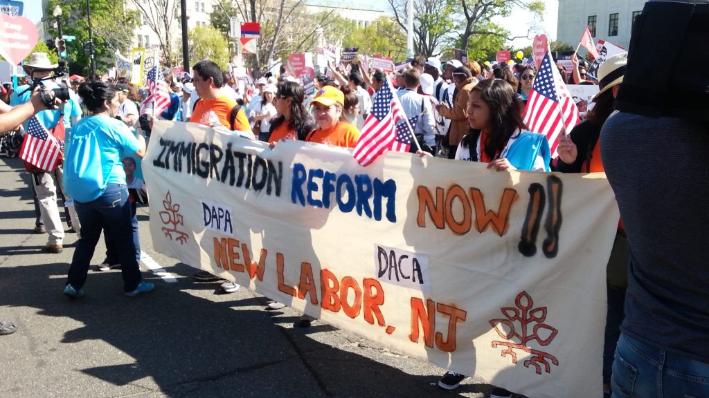 Protesters in front of Supreme Court during DAPA hearing, 18 April 2016